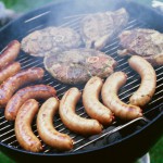 Grilled meat on barbecue grill --- Image by © Royalty-Free/Corbis